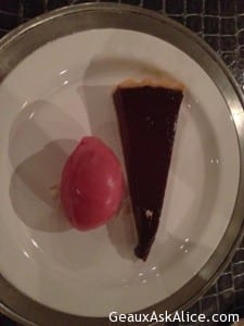 creamy chocolate tart with raspberry sorbet.
