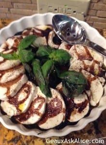 Fresh Slices of Mozzarella with Balsamic Reduction Sauce and Fresh Basil