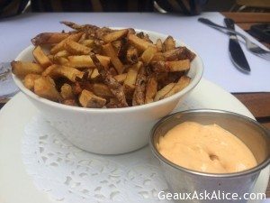 Lunch today at Boris Bistro! Their Famous Fries of course and a little Rabbit and a Mediterranean Chicken Salad. Looks like every one likes to have their glasses etched. Like that! 1