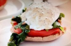 Kale and Tomato Eggs Benedict plated up.