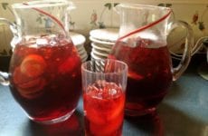 Pitcher And Glass Of Fresh Raspberry Lemonade Iced Tea