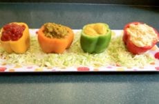 Bell peppers hollowed out and filled with condiments.