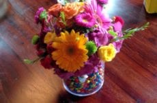 Three cups of Creme Brulee on a table.