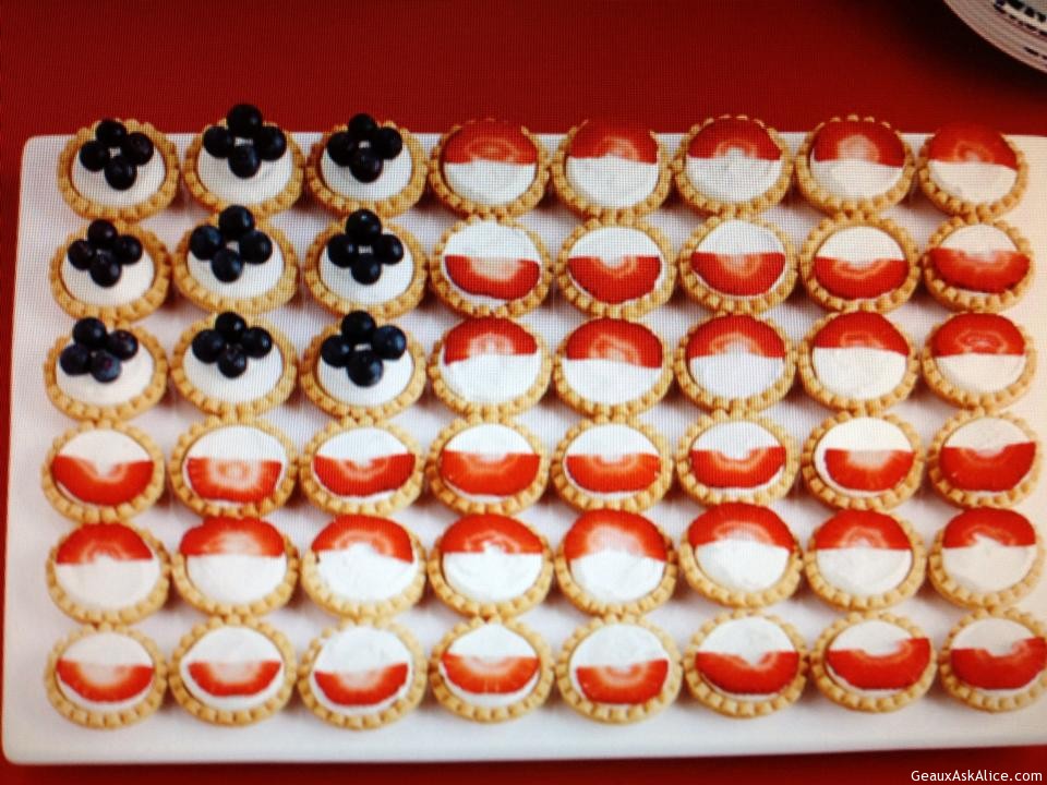 mini pies with strawberries and blueberries to look like a flag.