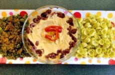 Frances' Hummus Bi Tahini Dip On A Tray With Chips.