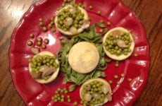 Artichoke Hearts Topped With Cream Peas And Pearl Onions