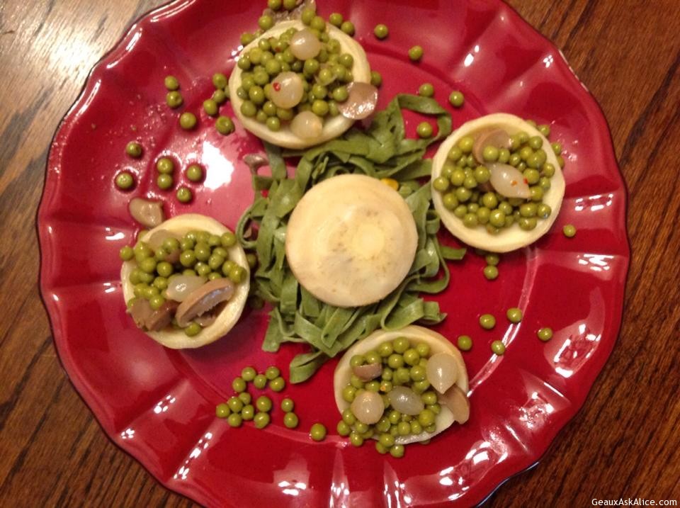 Artichoke Hearts Topped with Cream Peas and Pearl Onions
