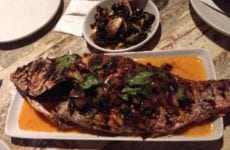 Peche - They serve whole fish and 2-3 people eat off of it. Family style.