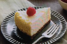 Alice’s Chocolate Amaretto Cheesecake with Raspberry Sauce