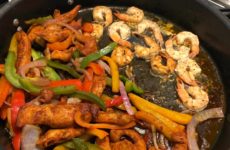 Mix of chicken and shrimp fajitas; veggie loaded pasta and shrimp salad