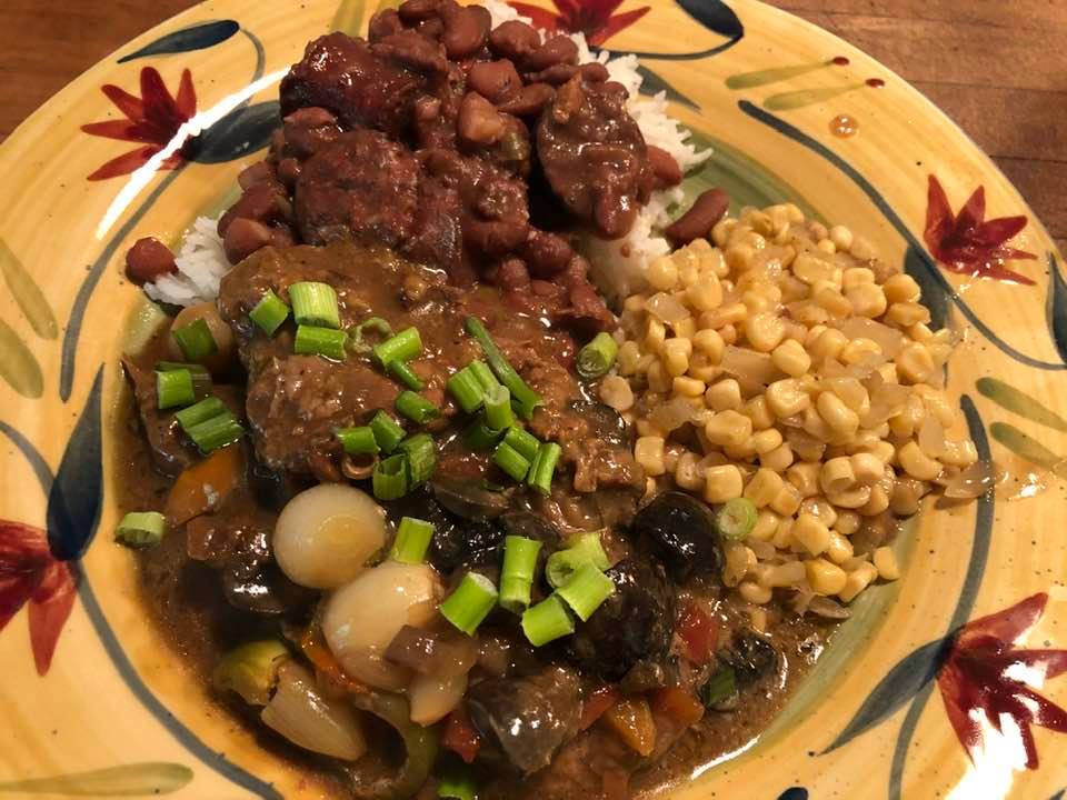 Another ole time meal. Monday special Smothered Round Steak, Red Beans and rice, corn and Salad
