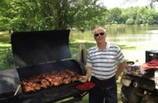 Hubby/Poppa with his world famous BBQ chicken!