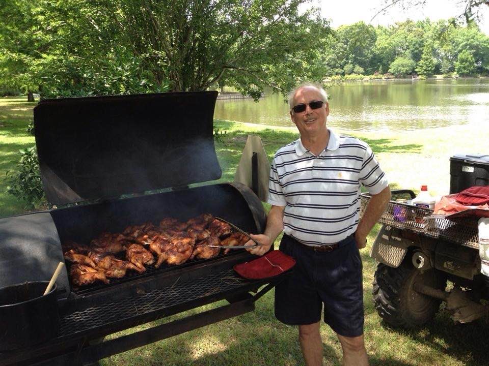 Hubby/Poppa with his world famous BBQ chicken!
