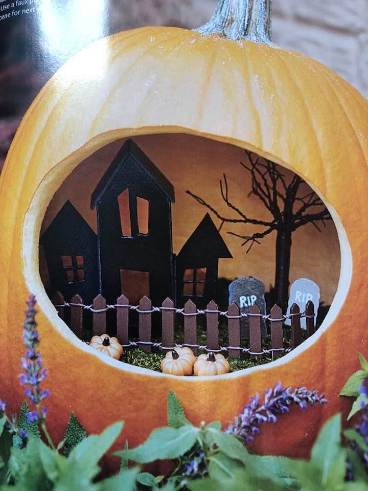 Cut out pumpkin with village inside!