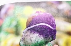 Mardi Gras cake ice cream cone with baby.