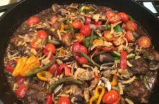 Smothered Breaded Chicken Thighs Topped with Crispy Onions