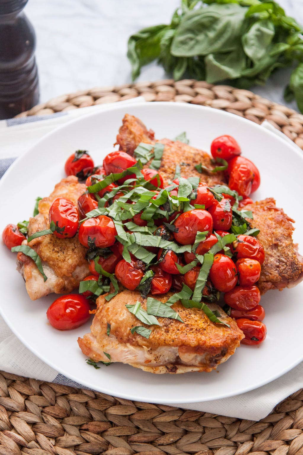 Crispy Pan-Seared Chicken Thighs with Blistered Cherry Tomatoes