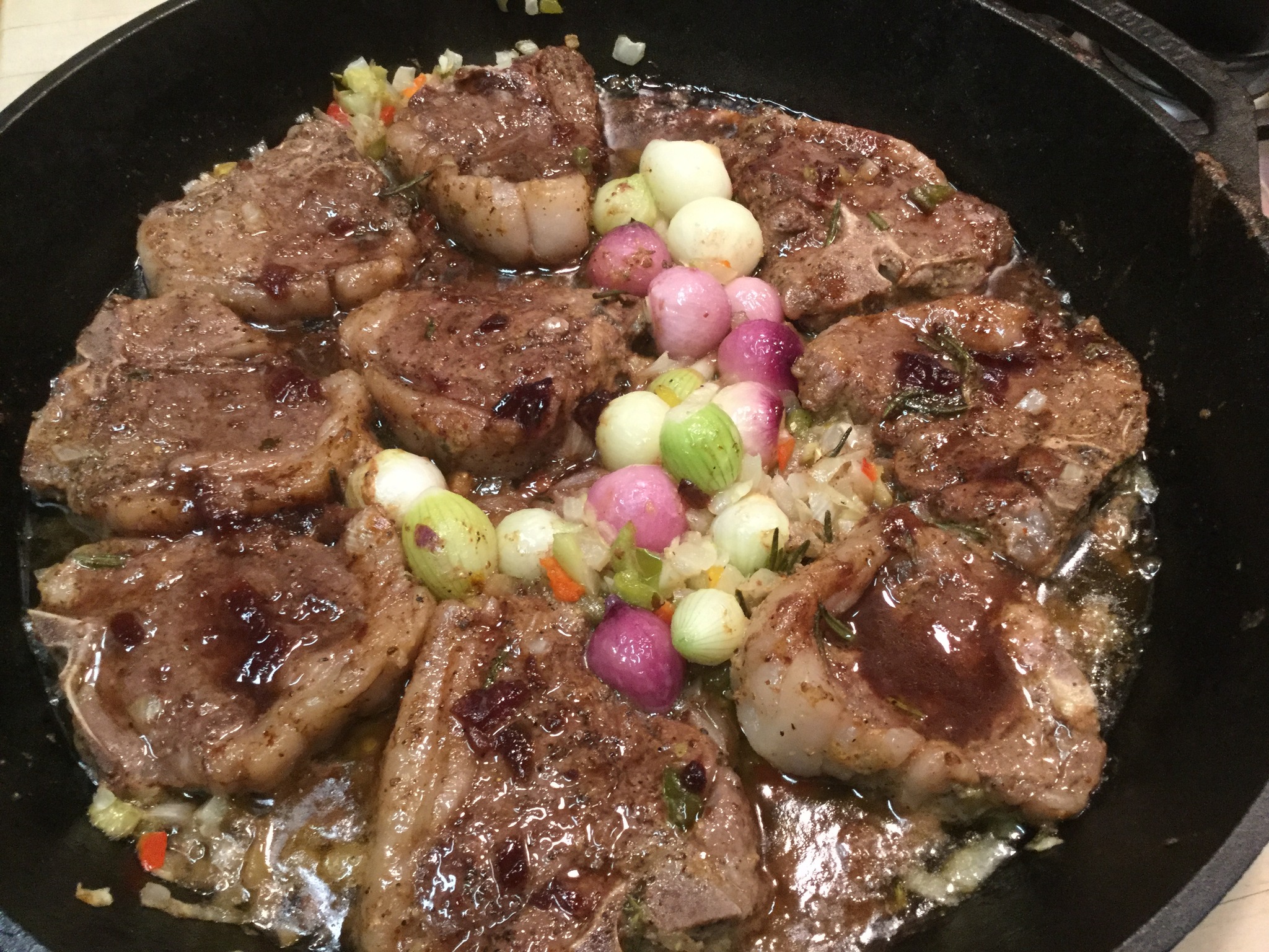 SKILLET BAKED LAMB CHOPS WITH RED AND WHITE PEARL ONIONS