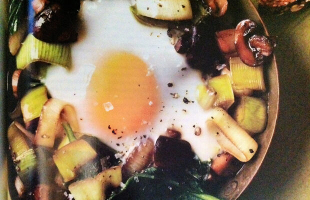BAKED EGGS OVER SAUTEED MUSHROOMS AND SPINACH